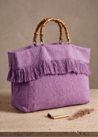 Sac de plage pour femme à franges. Coloris parme. 